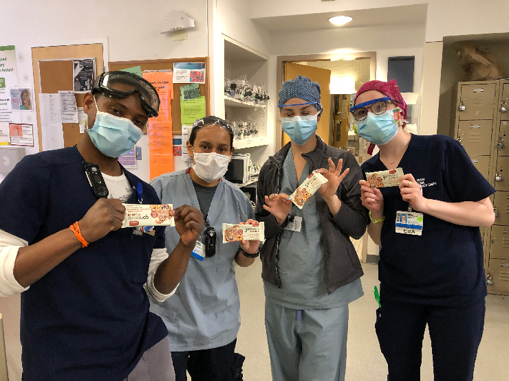 Frontline nurses holding macrobars