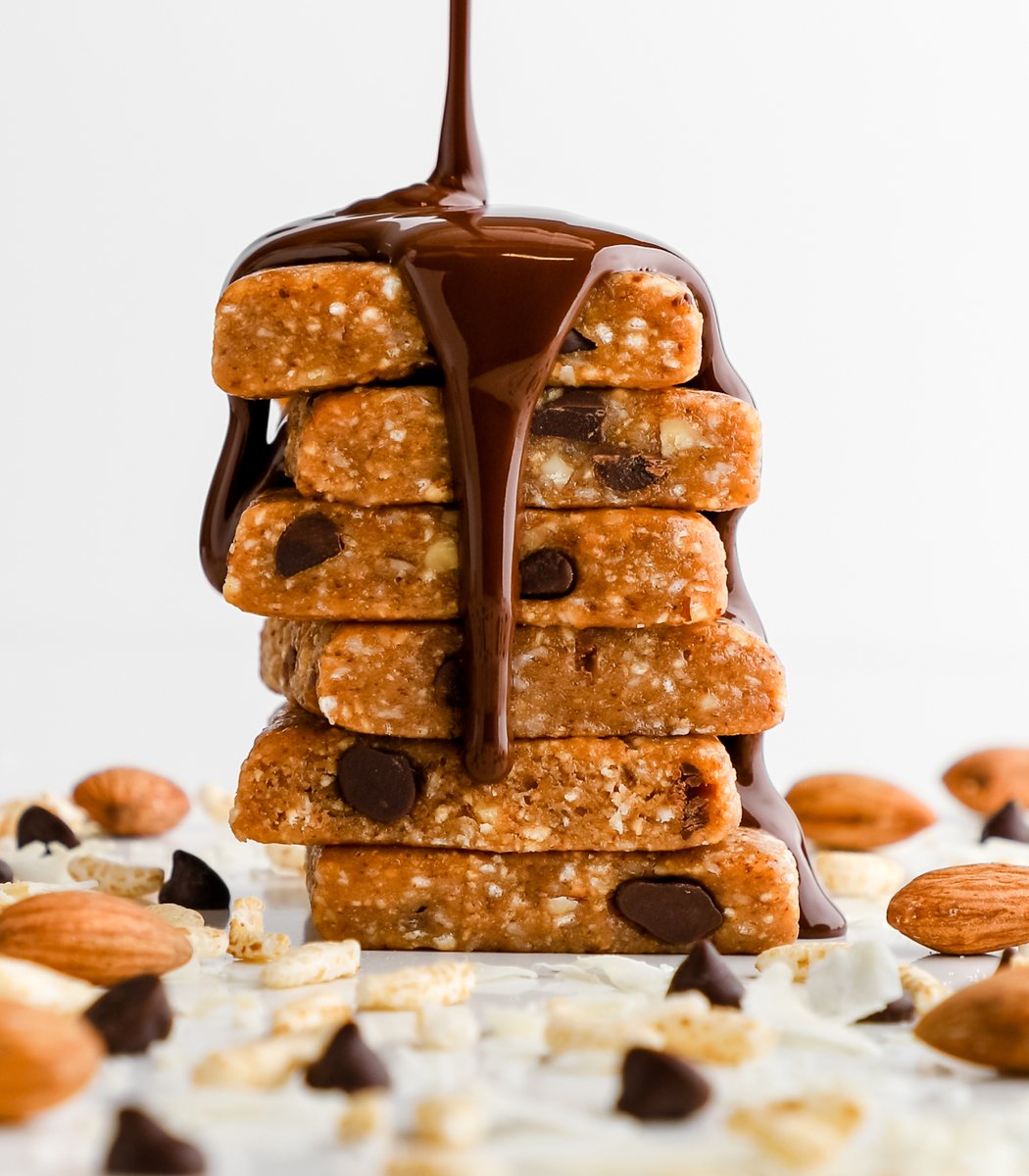 Stack of GoMacro coconut chocolate chip MacroBar minis drizzled in chocolate