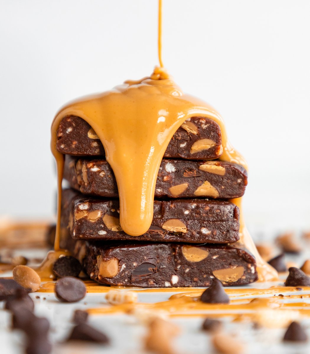 Stack of GoMacro Double Chocolate MacroBar Minis drizzled in peanut butter