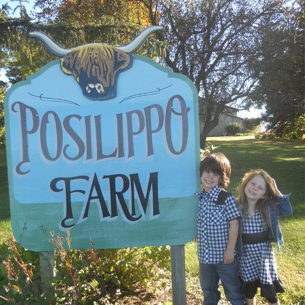 Kids in front of GoMacro's Viola, WI facility