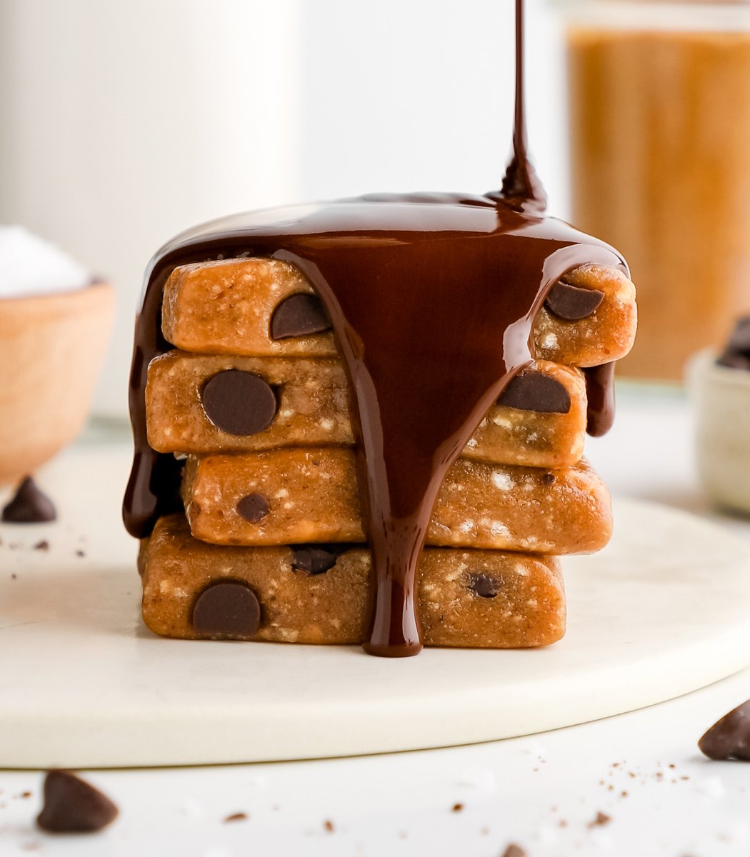 Stack of GoMacro Salted Caramel Chocolate Chip Macrobar Minis drizzled in chocolate