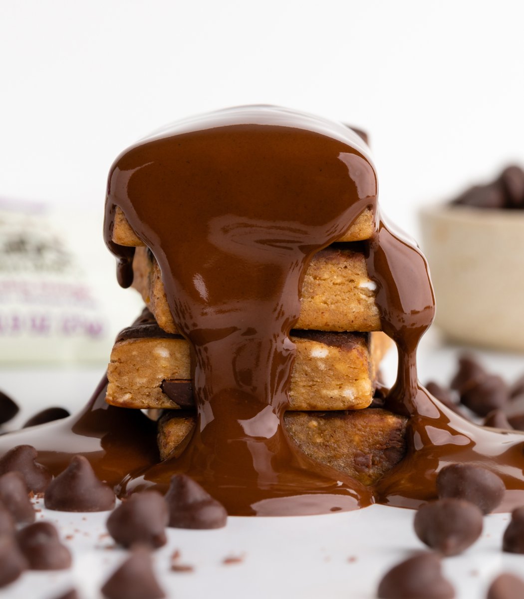 Stack of GoMacro kids bars drizzled in chocolate