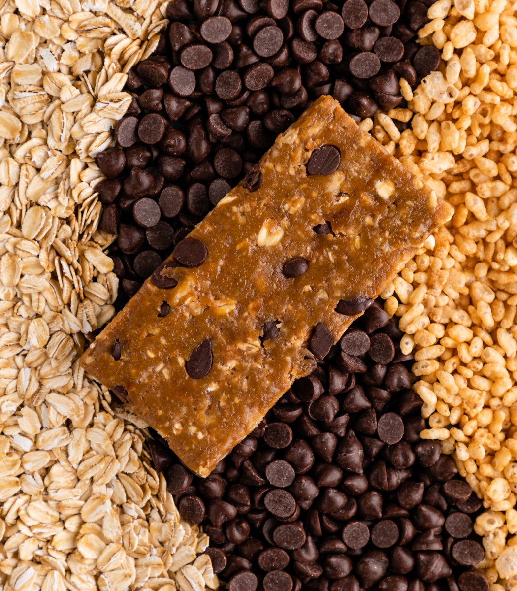 GoMacro nut-free protein bar laying on ingredients