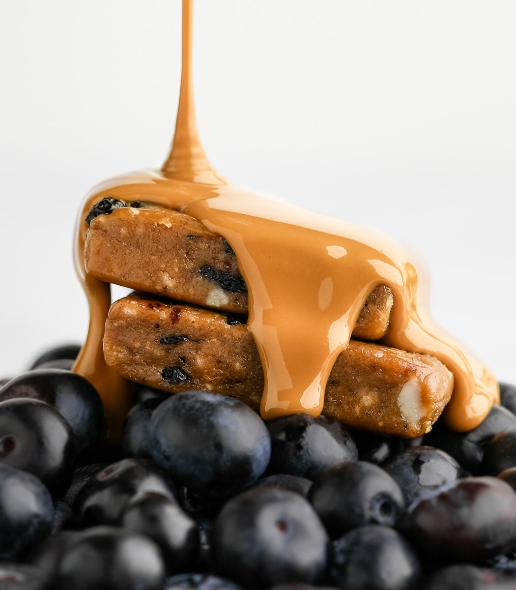 Stack of GoMacro bars drizzled in peanut butter