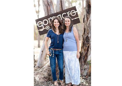 Jola and Amelia smiling in nature