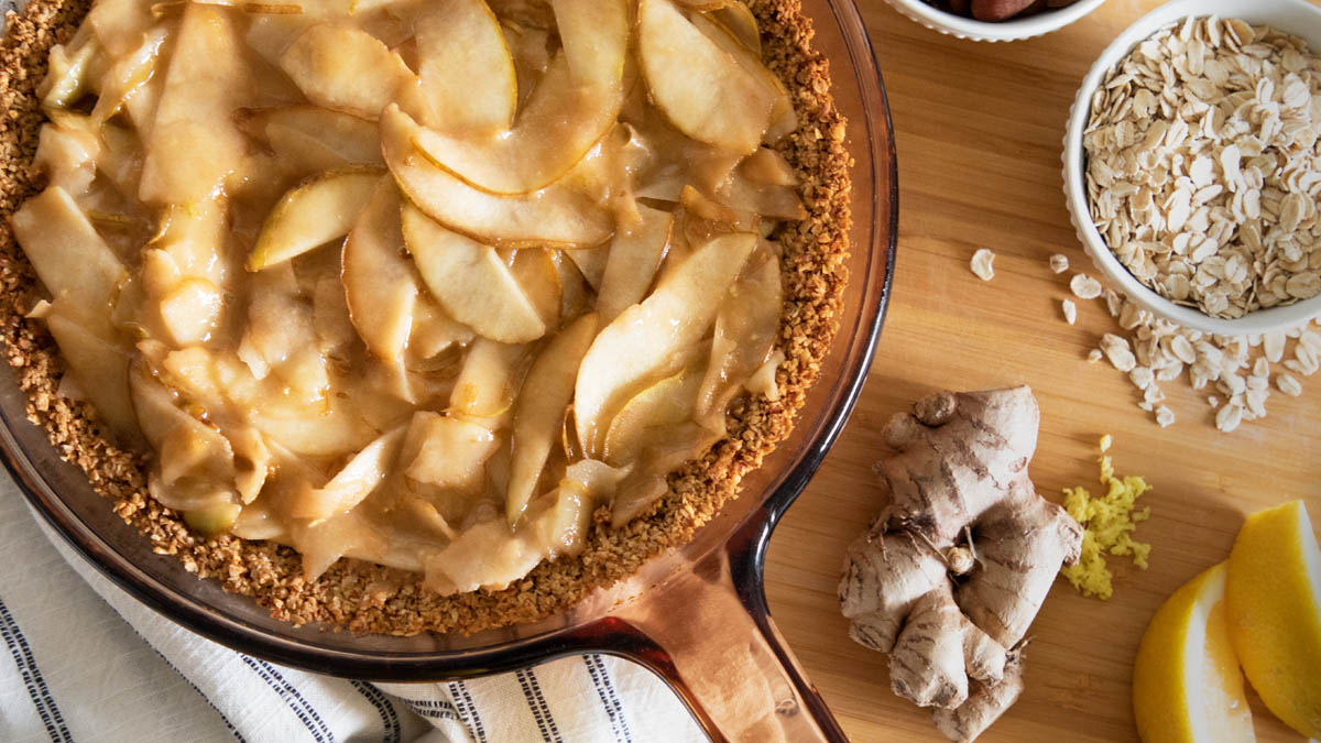 Pear ginger pie in pan on counter