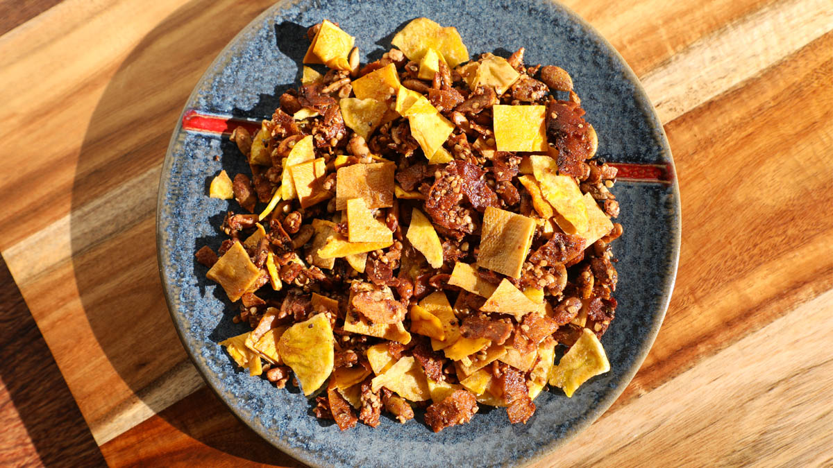 Plate of vegan granola with dried fruit