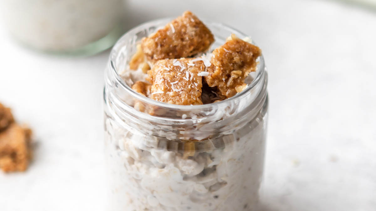 Granola and Coconut Overnight Oats topped with GoMacro balanced goodness bar