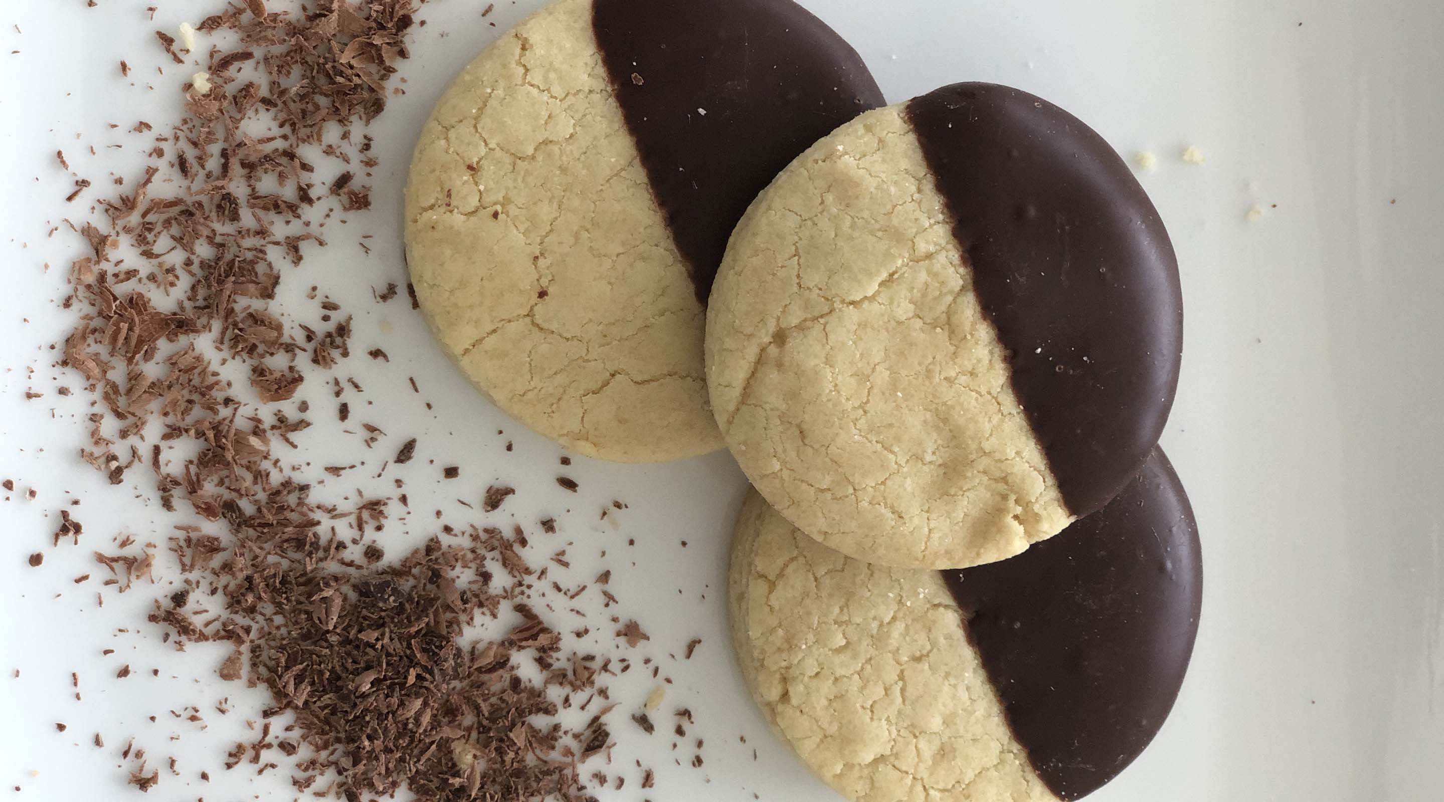 Gluten-free shortbread cookies half dipped in chocolate