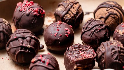 Chocolate truffles sprinkled with crushed freeze-dried berries