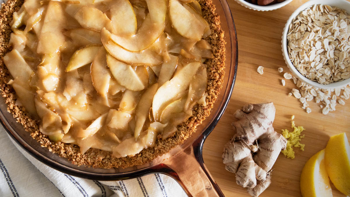 Pear ginger pie in pan on counter