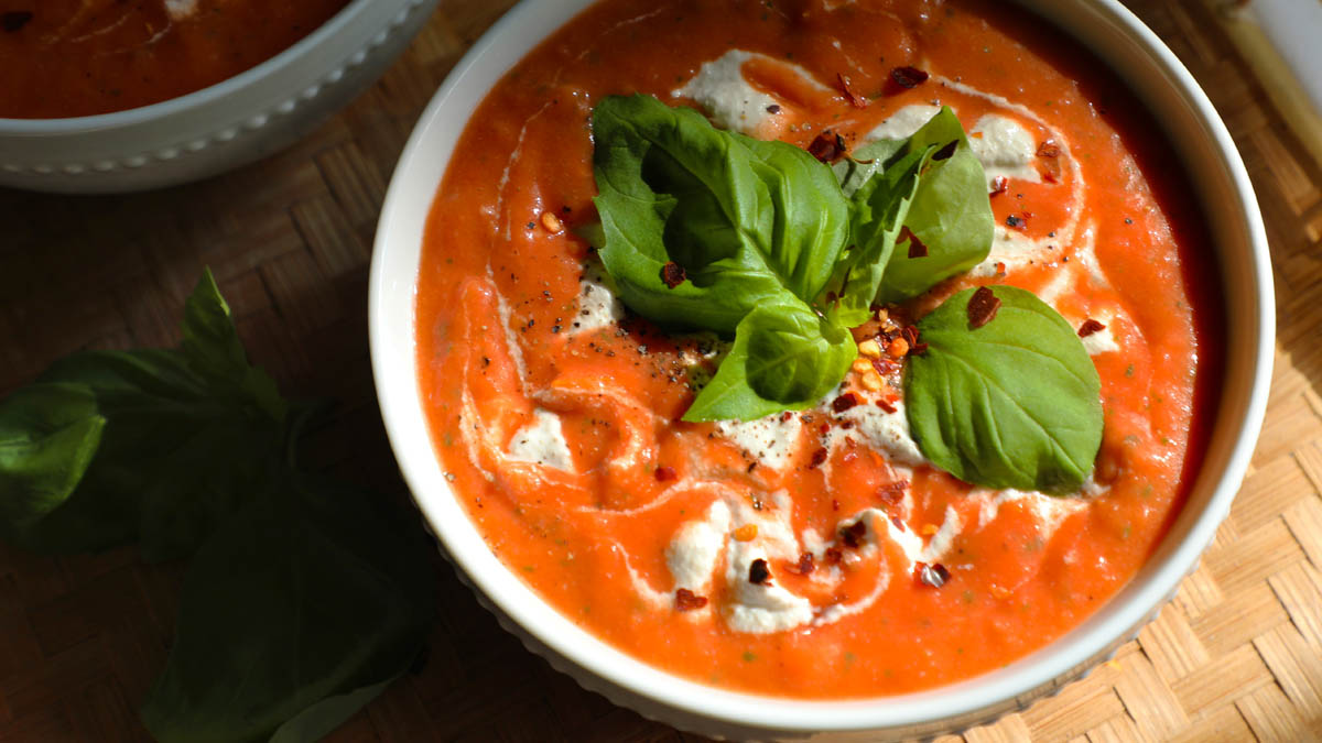 Tomato soup topped with red peppers