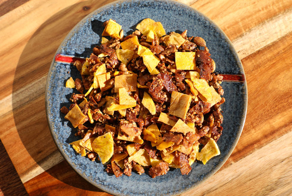 Plate of vegan granola with dried fruit