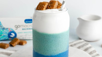 Layered peanut butter coconut smoothies topped with GoMacro protein bars