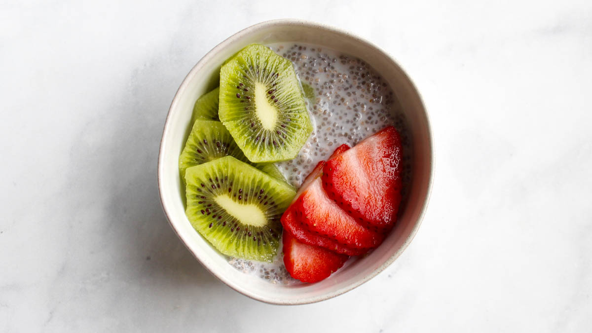 Chia pudding topped with kiwi and strawberry