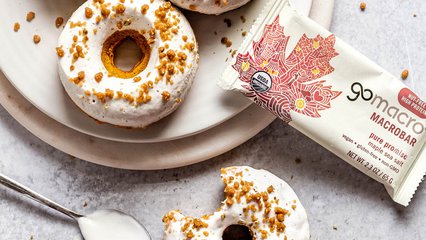 GoMacro protein bar next to baked pumpkin donuts with maple glaze