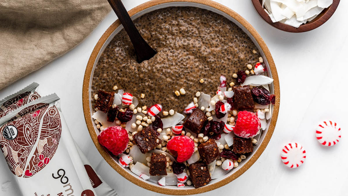 Chocolate chia seed bowl topped with peppermint and GoMacro mocha protein bar