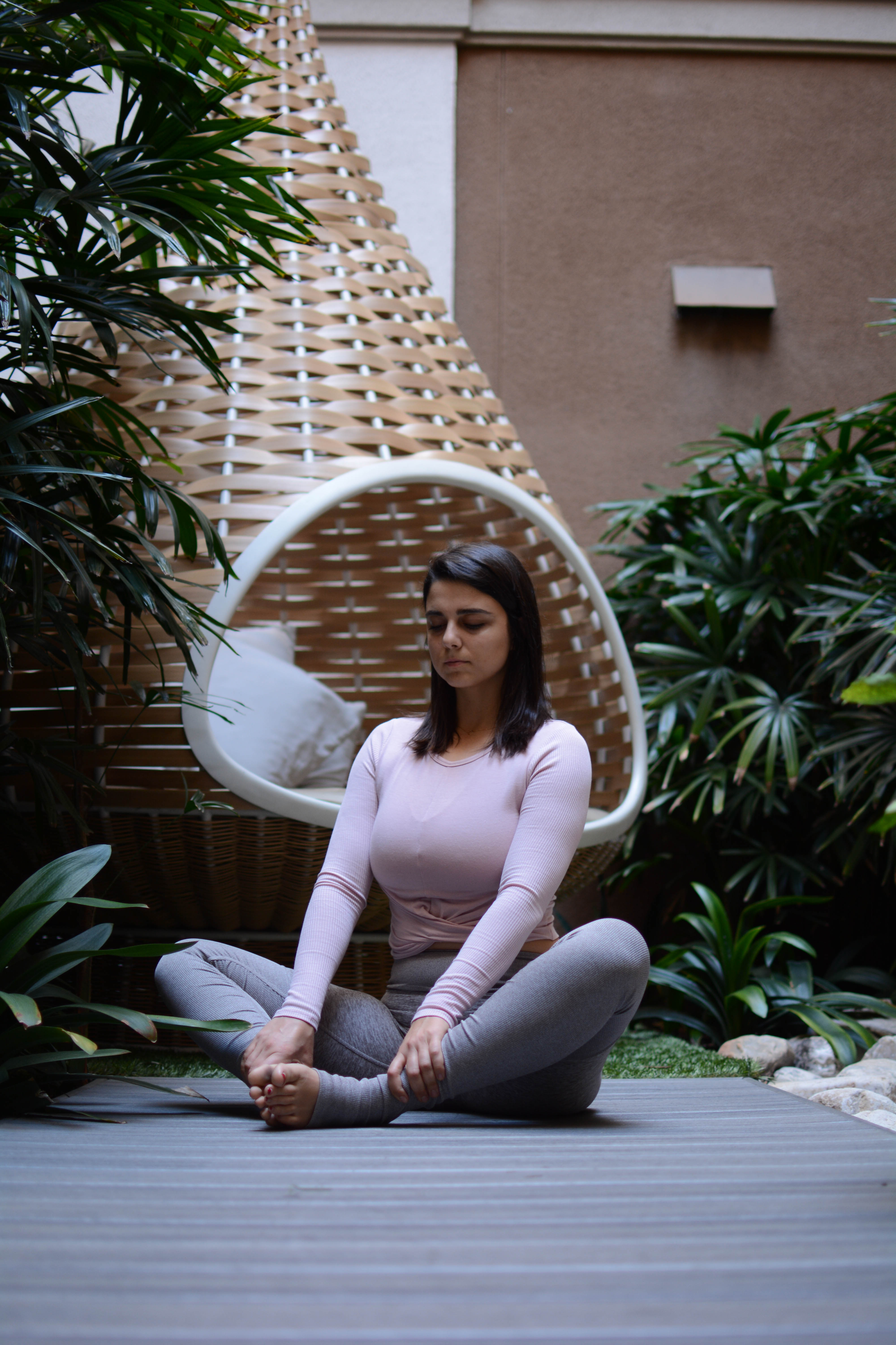Woman doing seated yoga pose